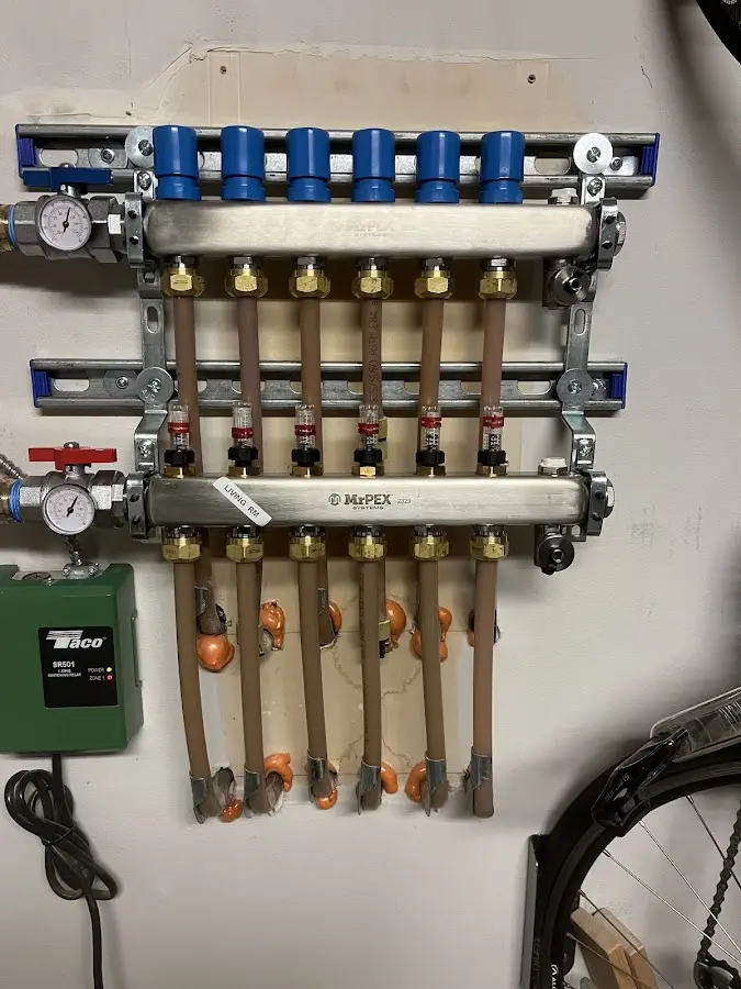 Plumber performing Gas Line Installation at a residential property in Colon